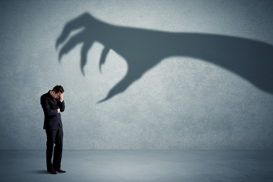 bigstock-Business-person-afraid-of-a-bi-187536745.jpg